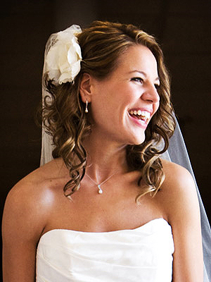 Pinned back with a hairpin and veil adds effortless style Braided Updo